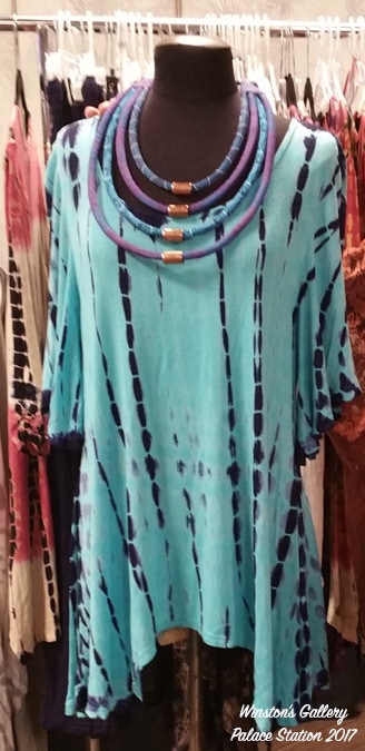 Fabric art displayed with dress