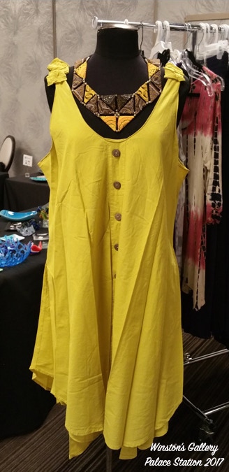 Fabric art displayed with dress